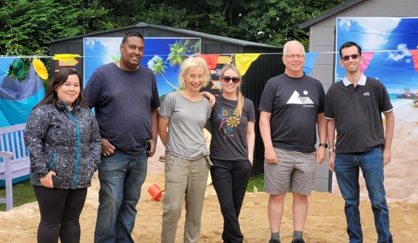Abbeyfield Living Society Staff Volunteering To Transform The Garden Into A Beach At Pratt House
