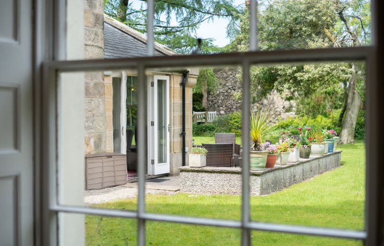 View Over The Garden From A Sash Window