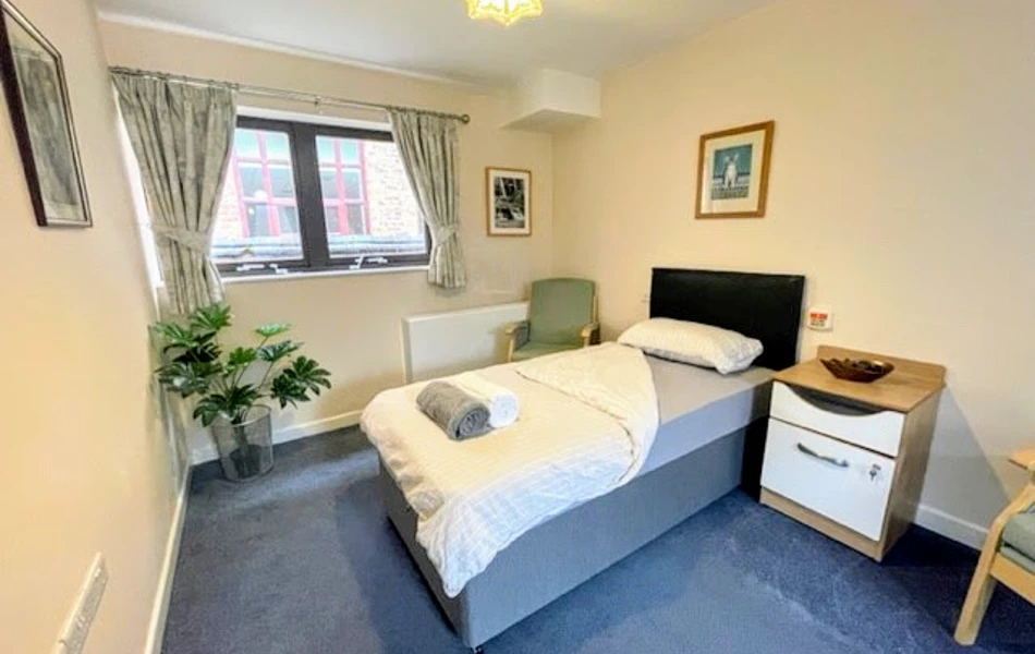 Internal view of residents bedroom at Downing House