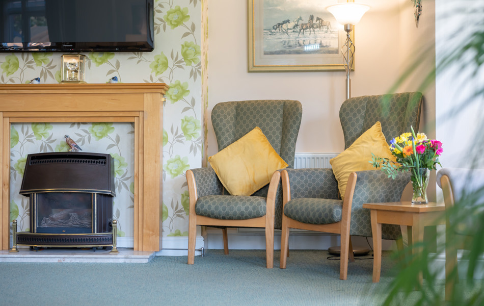 Lounge With Fireplace At Bradbury House