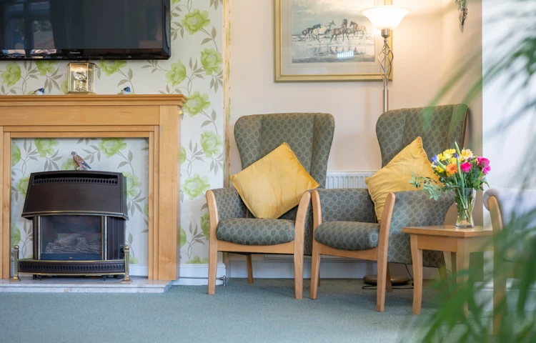 Lounge With Fireplace At Bradbury House