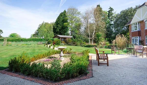 Peaceful and well-maintained garden at Westall House Residential Care Home in Horsted Keynes, providing a serene outdoor space for residents.