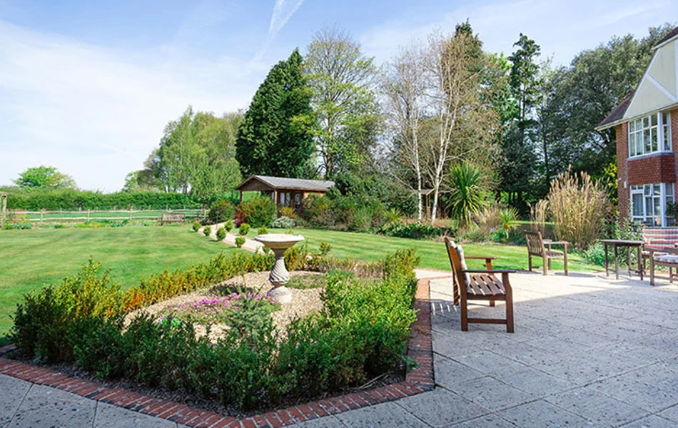Peaceful and well-maintained garden at Westall House Residential Care Home in Horsted Keynes, providing a serene outdoor space for residents.