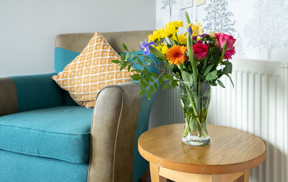 Lounge With Fresh Flowers At Bradbury House