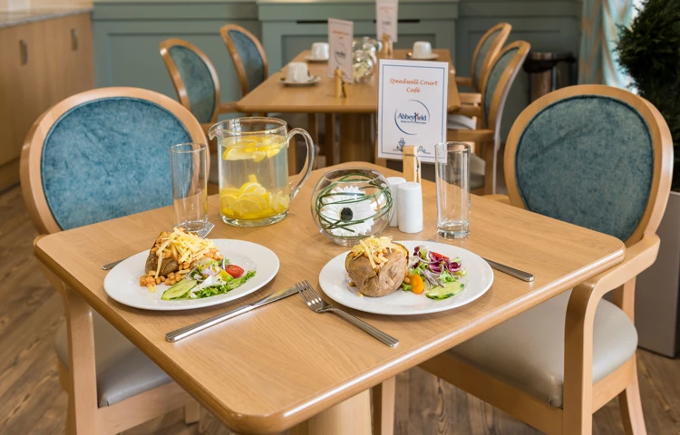 Table and chairs in communal cafe at Speedwell Court