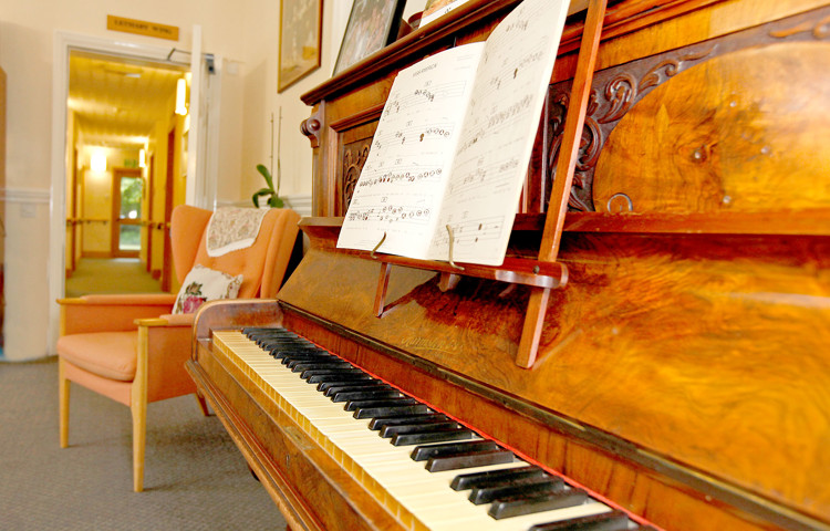 Piano and chair at Hill House
