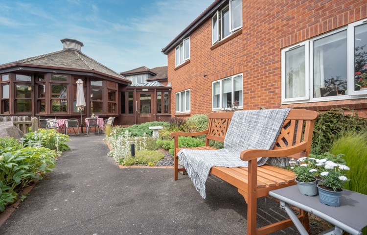 Holloway House Bench And Flower Beds