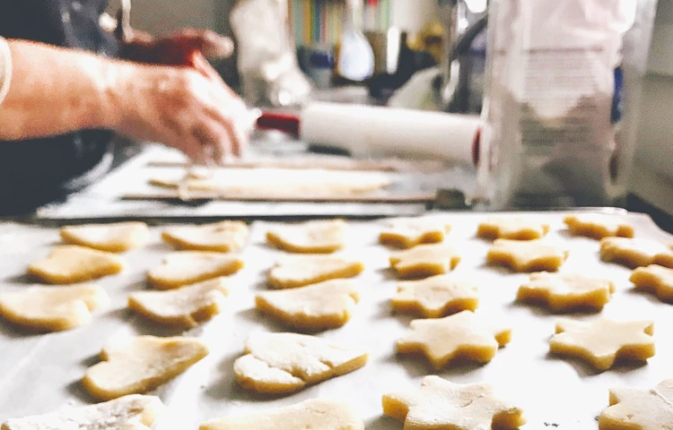 Baking biscuits for residents at Abbeyfield House