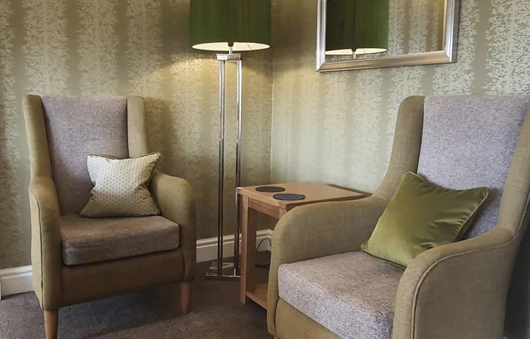 Two chairs in the interior of Abbeyfield House, Garstang PR3 1PA