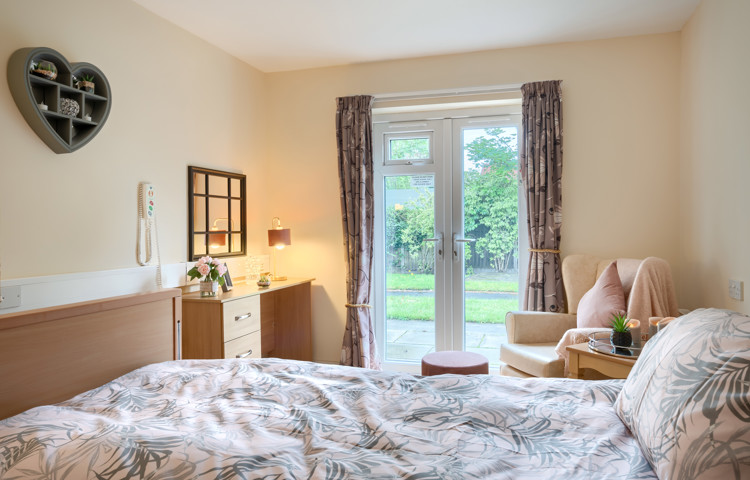 Resident bedroom with access in to our beautiful garden