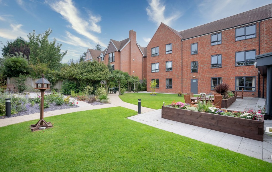 External shot of spacious garden with planter at Hampton House Solihull