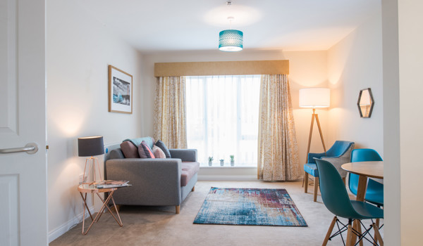 A bright tastefully decorated living room at Hope Bank View