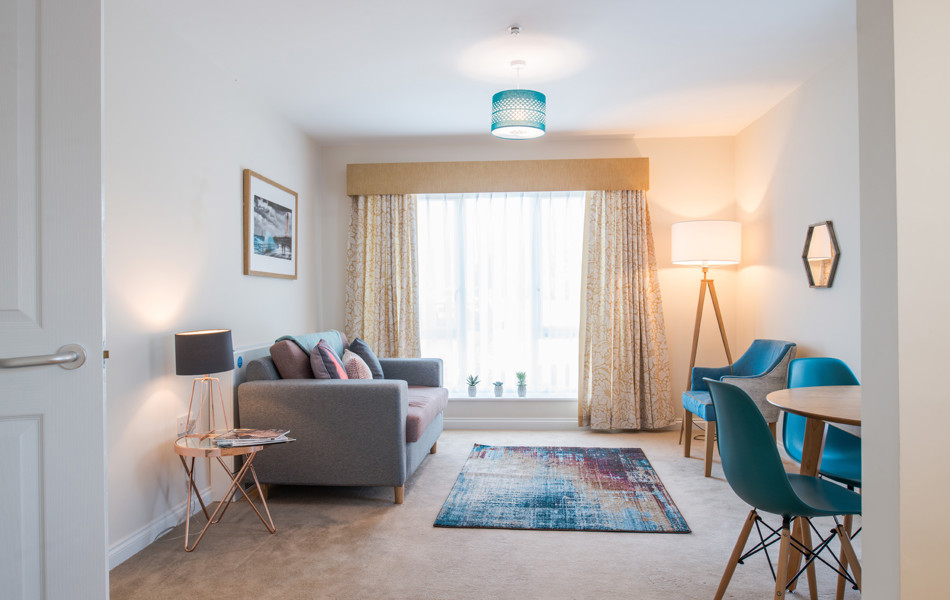 A bright tastefully decorated living room at Hope Bank View