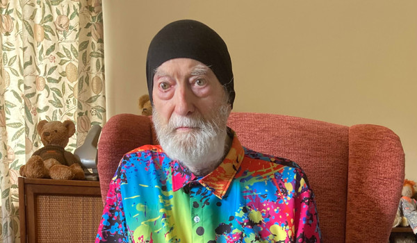 Photo Of David Sitting In Chair