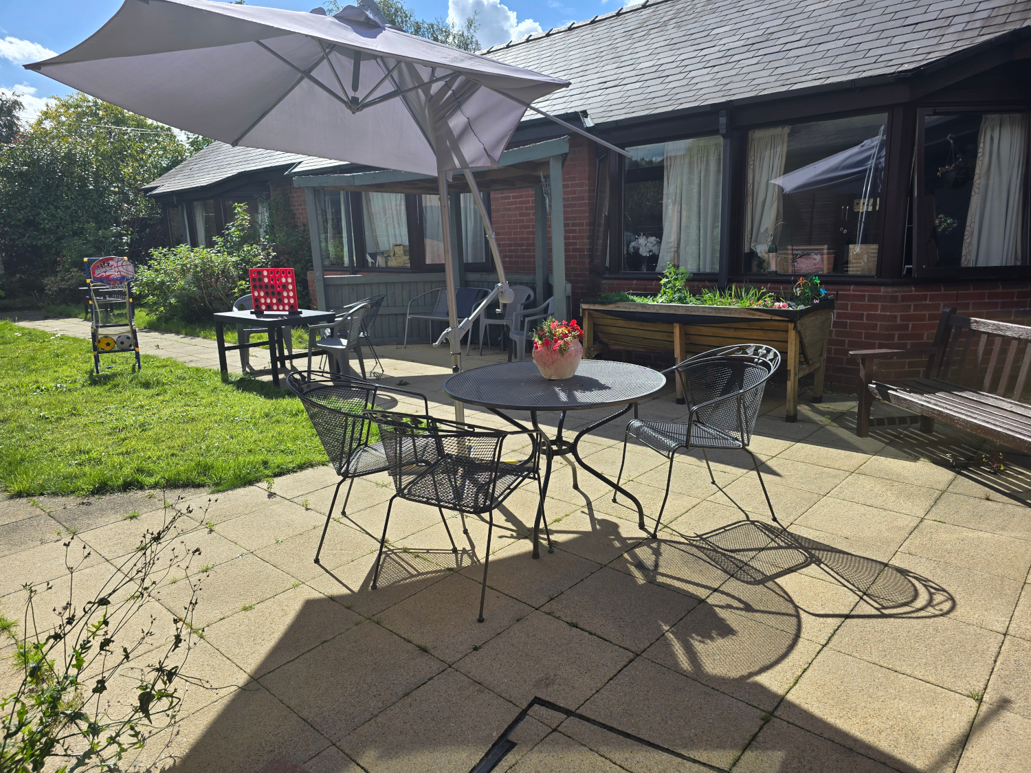 Sunny Garden Where Residents Can Relax And Socialise At Downing House