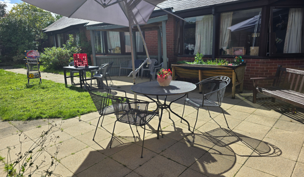 Sunny Garden Where Residents Can Relax And Socialise At Downing House