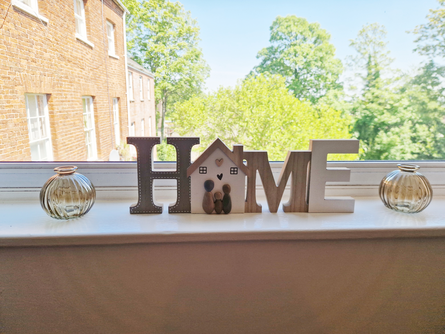 Home Sign On Windowsill At Ivy House