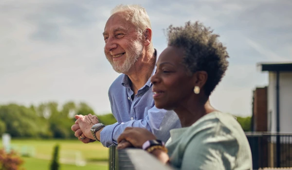 Retired Man And Woman Relaxing Outdoors (1)