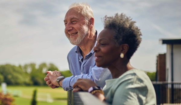 Retired Man And Woman Relaxing Outdoors (1)